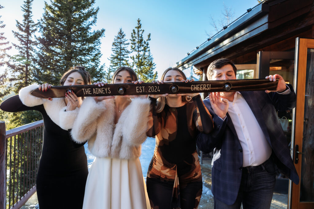 Bride and friends do a shotski.