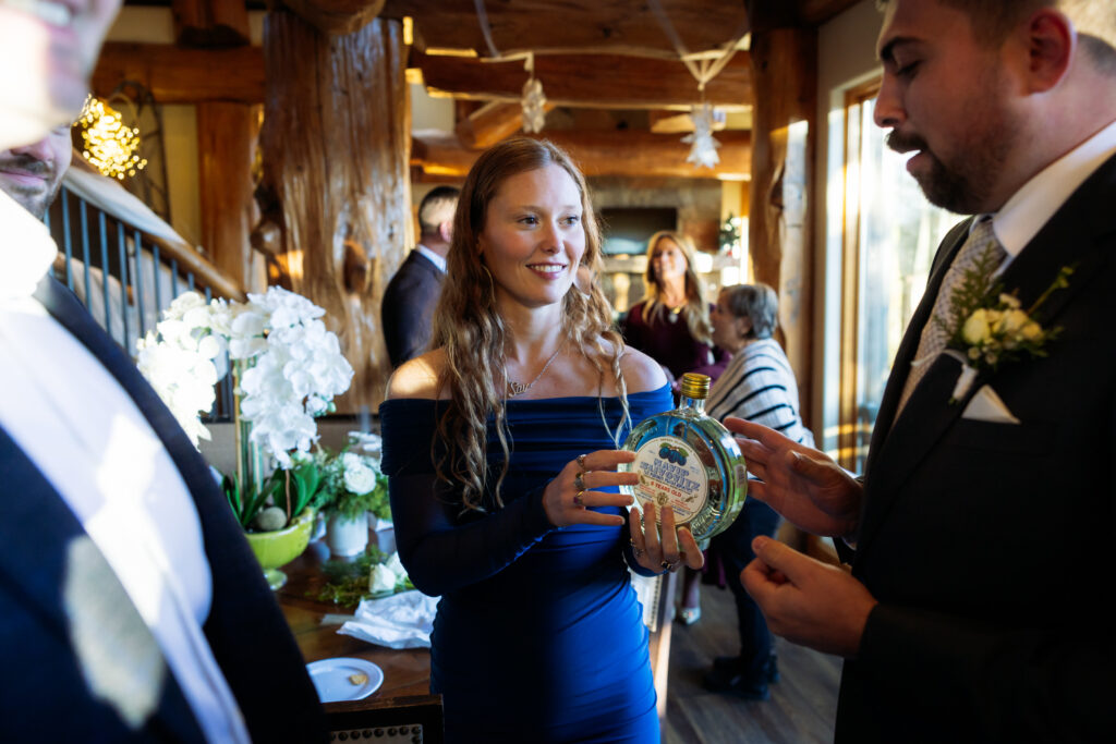 Special liquor is distributed to celebrate the bride and groom.