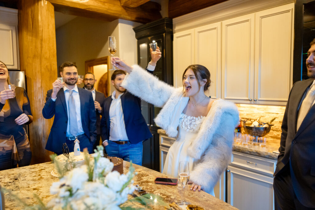 Bride cheersing everyone for coming to Colorado to celebrate her elopement.