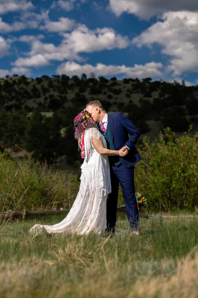 Summer elopement in Colorado with bright colors and florals.