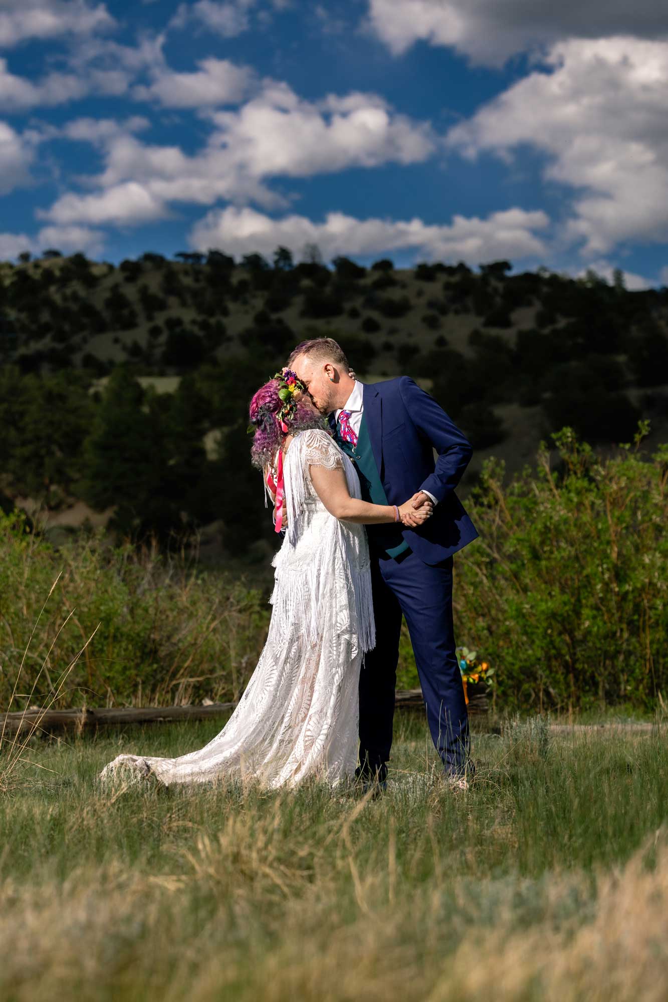 Summer elopement in Colorado with bright colors and florals.