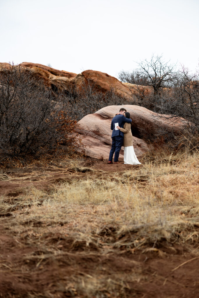 Couple shares vows during intimate Colorado elopement.