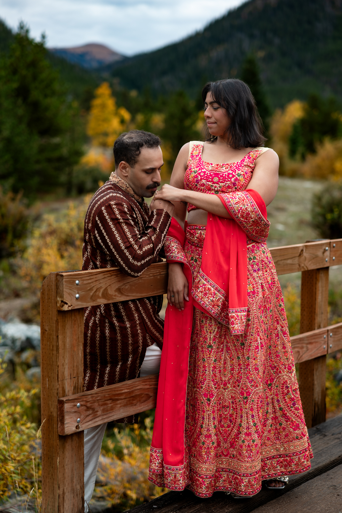 Colorado couple wearing colorful clothes at their elopement.