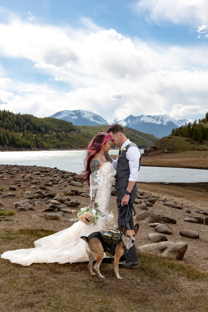 Bride chooses flowy dress she can move around in for Colorado elopement.
