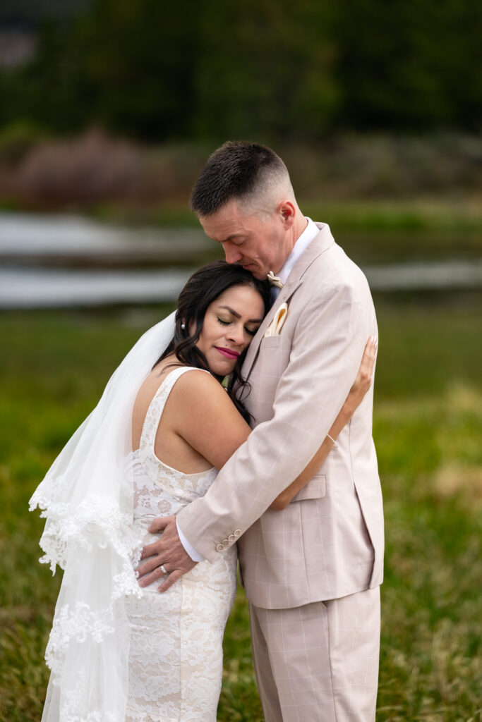 Couple embracing during their Buena Vista elopement on a private Colorado ranch.