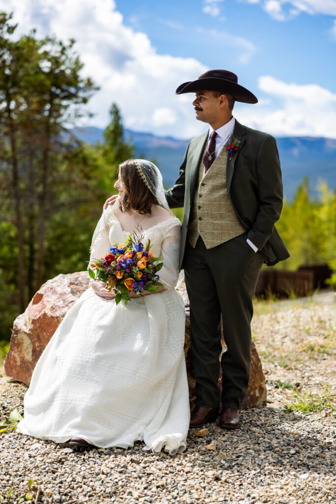 Colorado elopement couple surrounded by fall aspens near Leadville