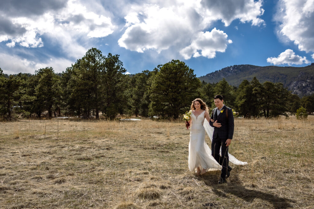 Couple exploring the mountains during Evergreen Colorado elopement
