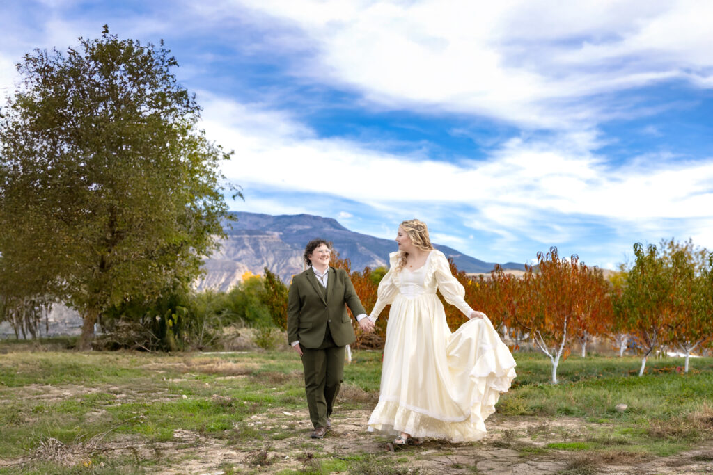 Couple exploring mountain scenery during a Palisade elopement
