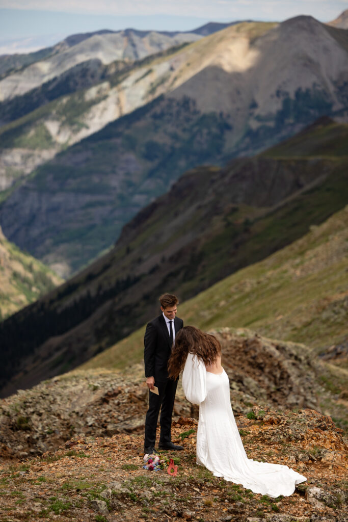 bride and groom say vows during ouray elopement