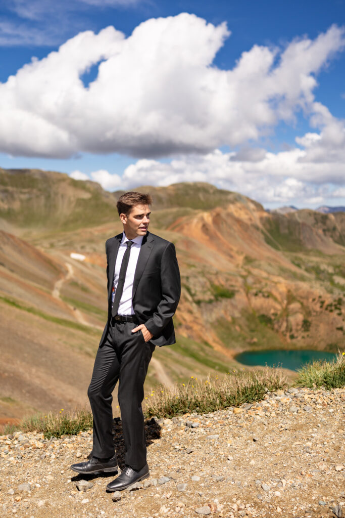 Groom getting ready during Ouray elopement